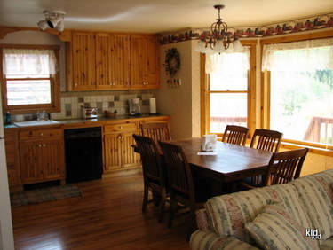 Elk cabin has a spacious kitchen/dining/living room.