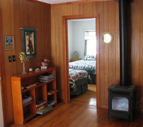 Stay cozy by the stove in Trails End.